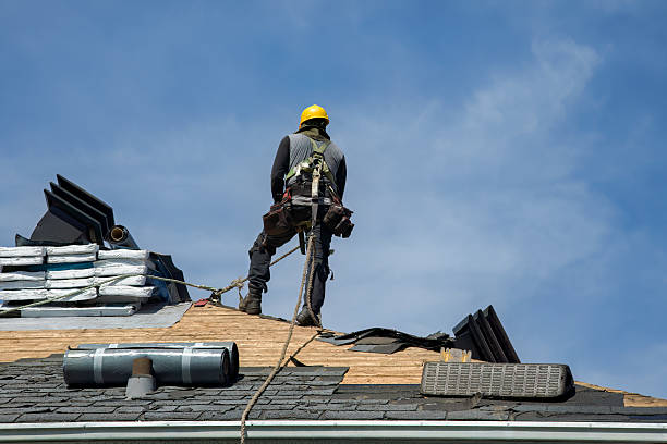 Professional Roofing technician working in West Alton, MO